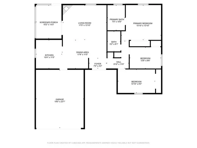 an aerial view of a house with a yard basket ball court and outdoor seating