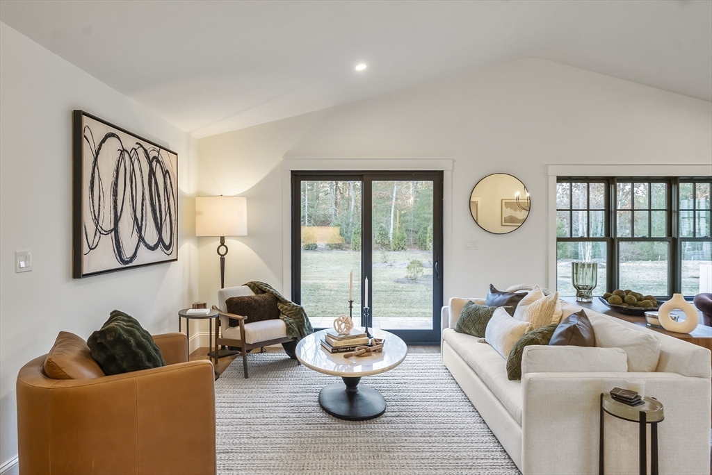 46 Sandwich Road, Unit 39 Plymouth, MA 02360 - Photo 17 of 41 a living room with furniture and a large window