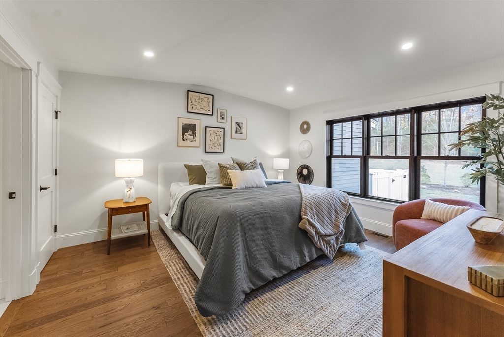 46 Sandwich Road, Unit 39 Plymouth, MA 02360 - Photo 18 of 41 a spacious bedroom with a bed and window