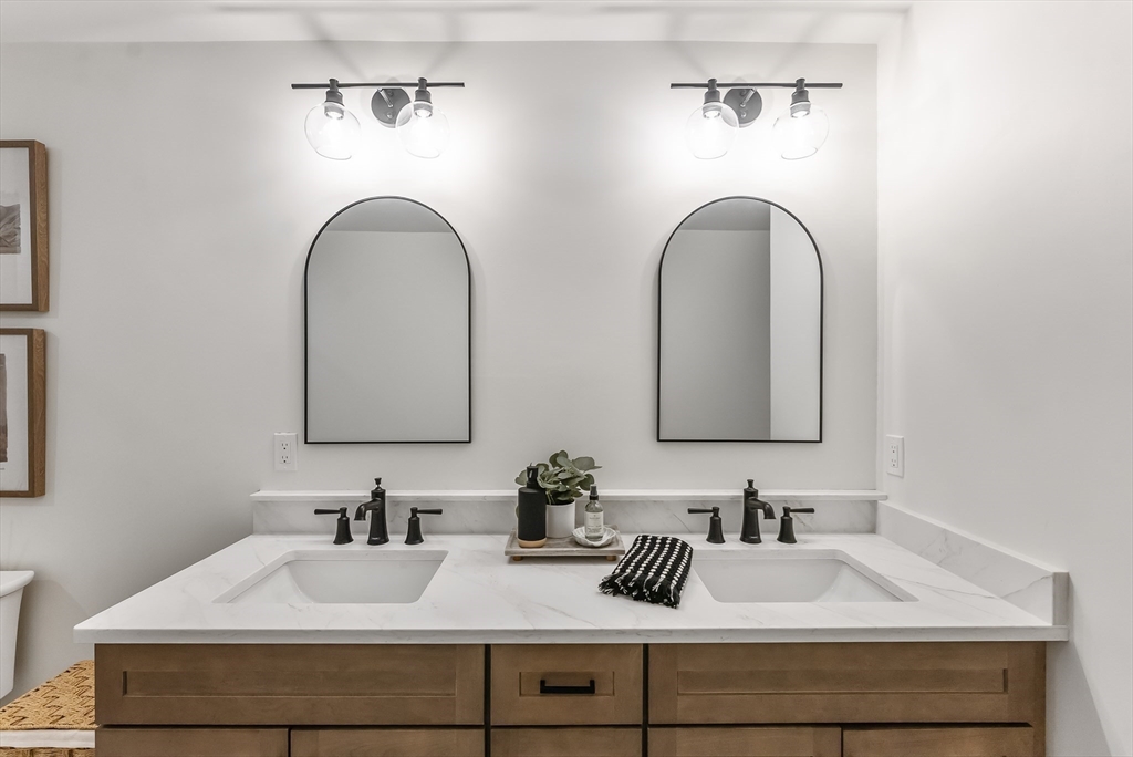 46 Sandwich Road, Unit 39 Plymouth, MA 02360 - Photo 21 of 41 a bathroom with sinks and vanity