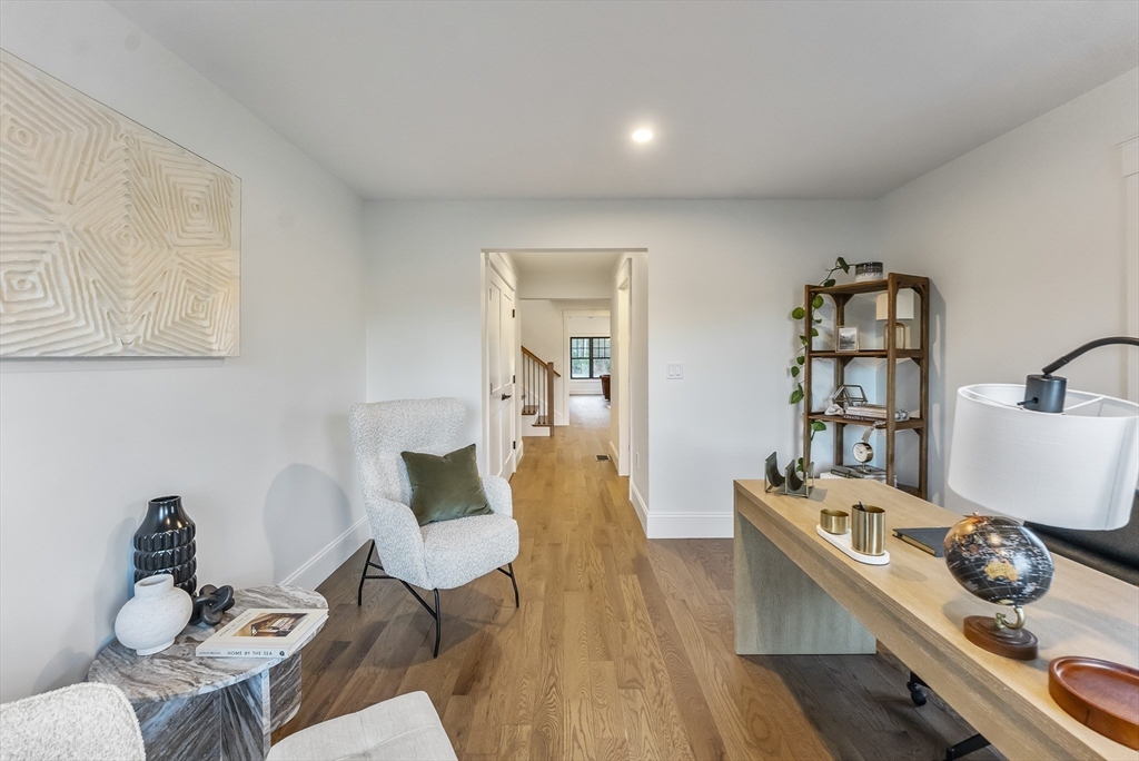 46 Sandwich Road, Unit 39 Plymouth, MA 02360 - Photo 28 of 41 a living room with furniture and wooden floor