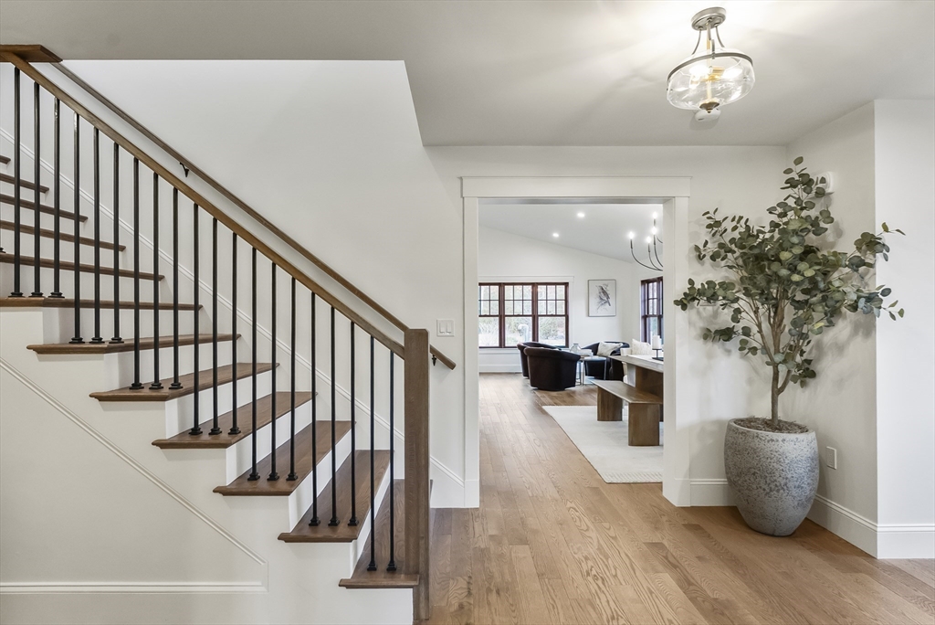 46 Sandwich Road, Unit 39 Plymouth, MA 02360 - Photo 29 of 41 a view of entryway with wooden floor and a potted plant