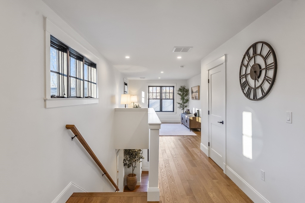 46 Sandwich Road, Unit 39 Plymouth, MA 02360 - Photo 30 of 41 a view of a hallway with seating area