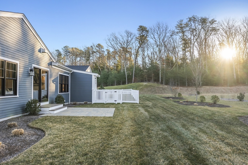 46 Sandwich Road, Unit 39 Plymouth, MA 02360 - Photo 35 of 41 a view of a house with backyard and trees