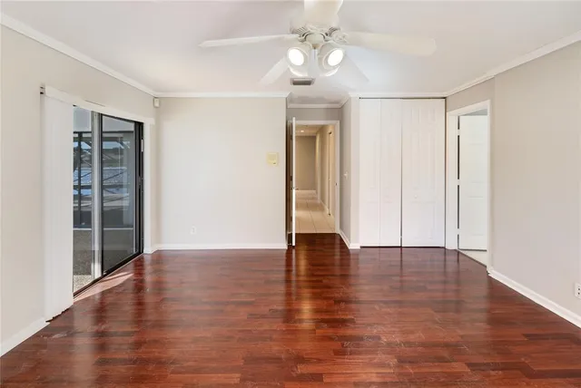a spacious bathroom with a granite countertop sink mirror and bathtub