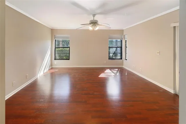 a bathroom with a tub a sink and glass door shower