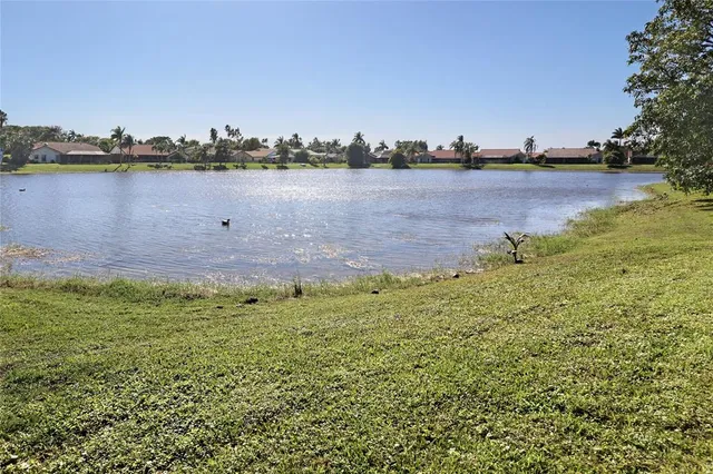 a view of a lake in middle of the town