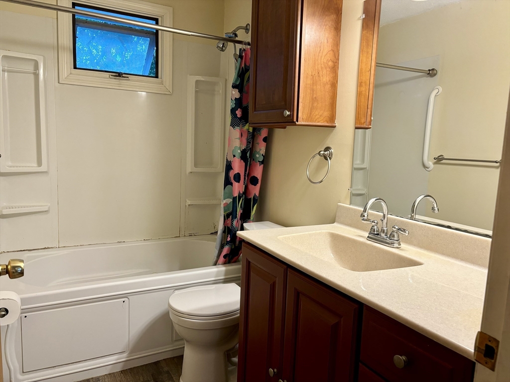 4 Eastern Avenue Burlington, MA 01803 - Photo 11 of 22 a bathroom with a sink a toilet and shower