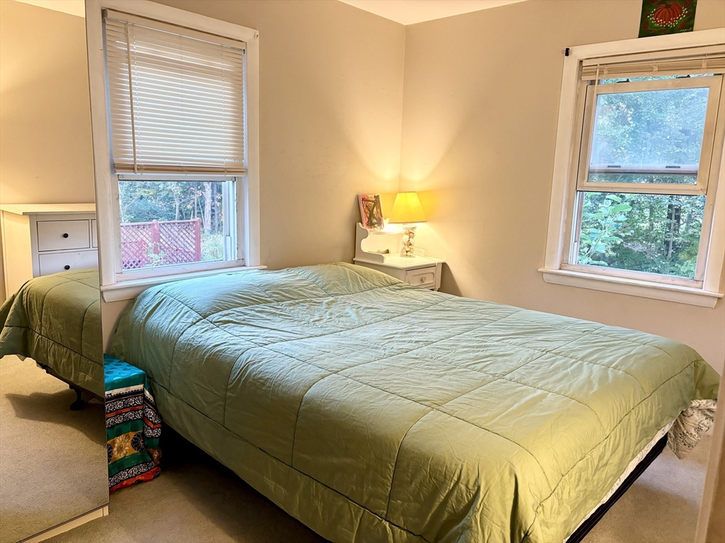4 Eastern Avenue Burlington, MA 01803 - Photo 12 of 22 a bedroom with a bed and window
