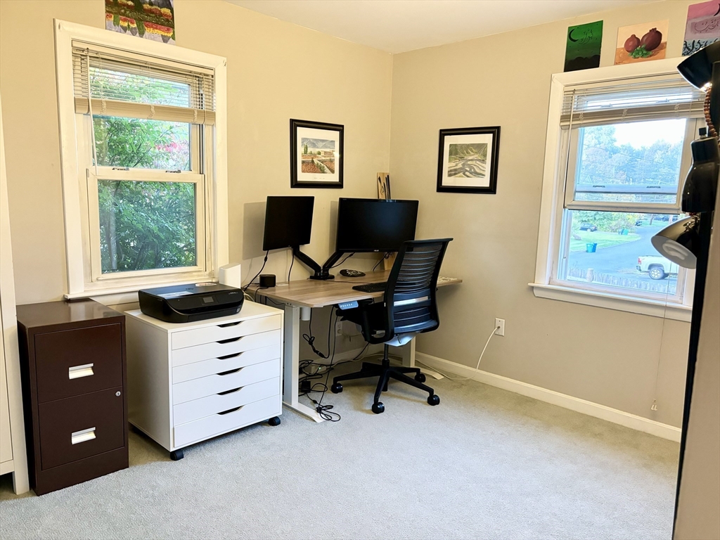 4 Eastern Avenue Burlington, MA 01803 - Photo 14 of 22 a room with furniture and a window