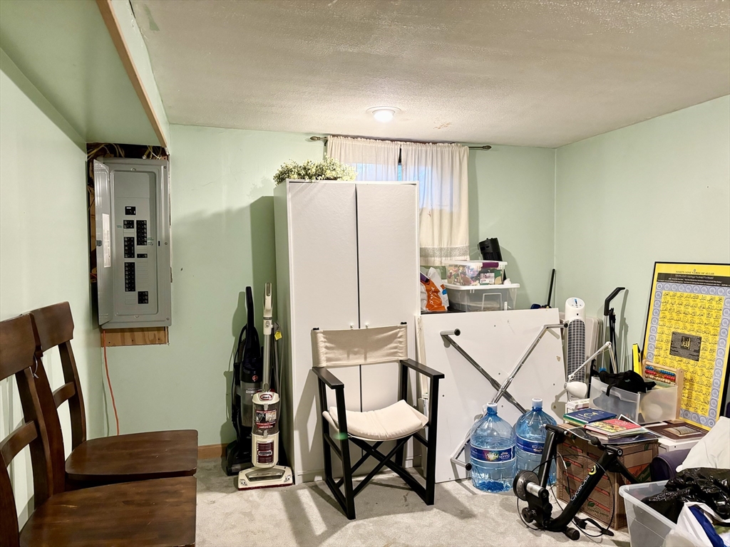 4 Eastern Avenue Burlington, MA 01803 - Photo 16 of 22 a work room with furniture and wooden floor
