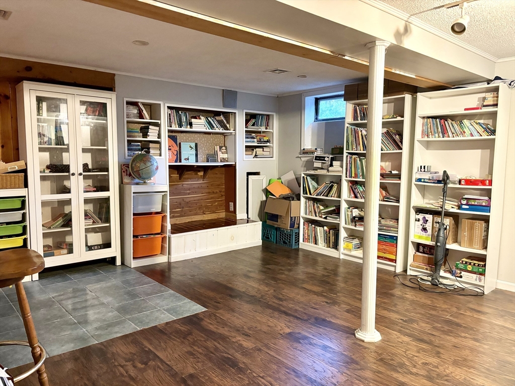 4 Eastern Avenue Burlington, MA 01803 - Photo 17 of 22 a view of an empty room with wooden floor and windows