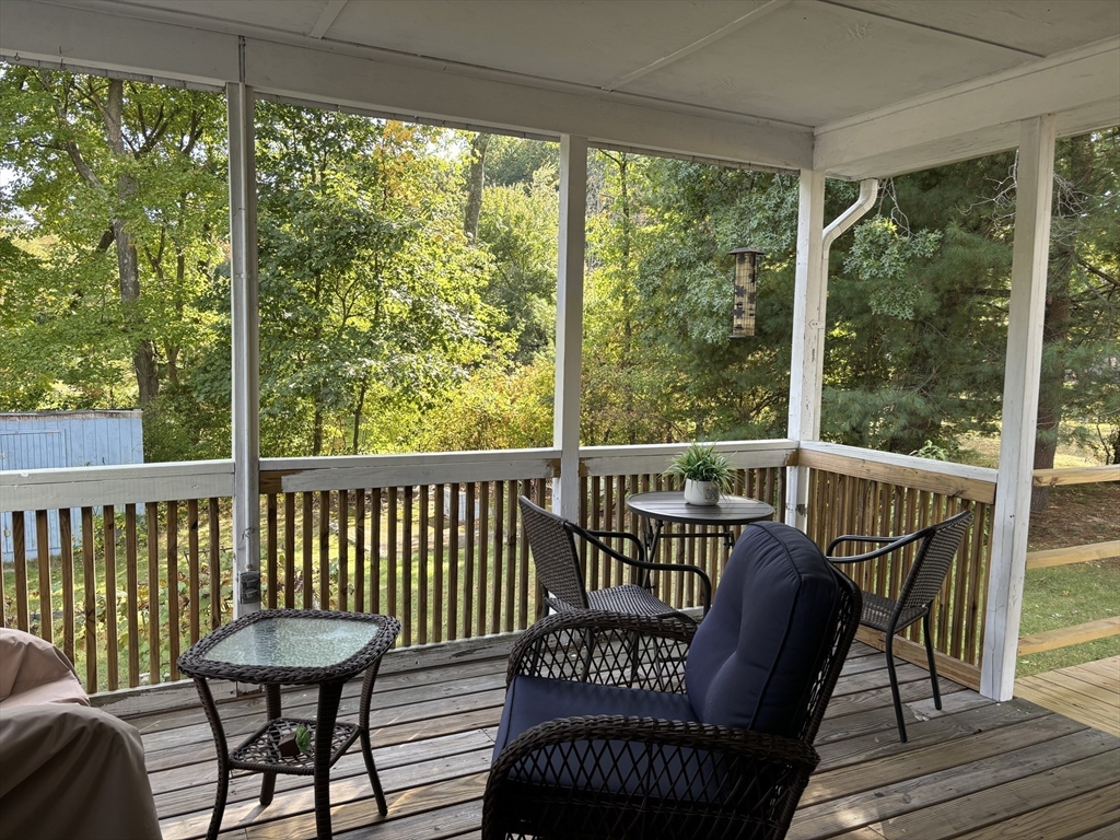 4 Eastern Avenue Burlington, MA 01803 - Photo 21 of 22 a view of a chair in wooden deck