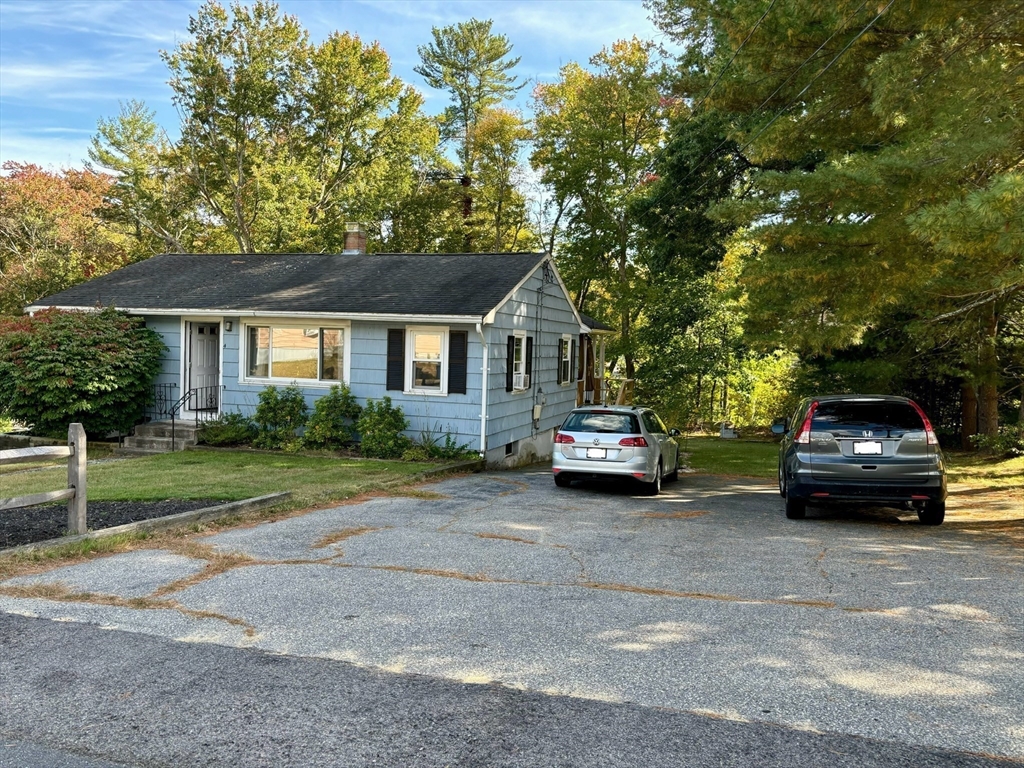 4 Eastern Avenue Burlington, MA 01803 - Photo 3 of 22 a car parked in front of a house