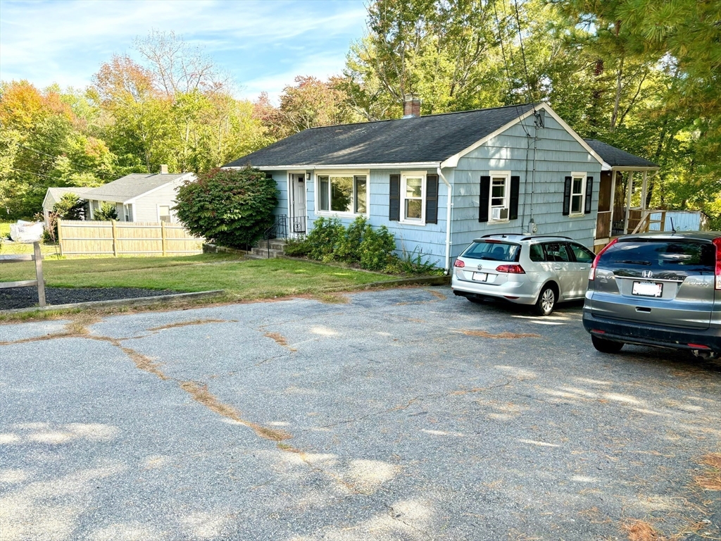 4 Eastern Avenue Burlington, MA 01803 - Photo 4 of 22 a car parked in front of a house