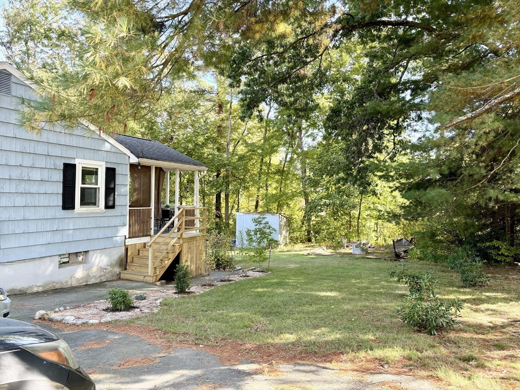 4 Eastern Avenue Burlington, MA 01803 - Photo 5 of 22 a view of a house with backyard
