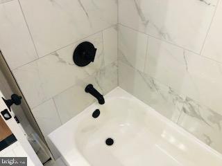 114 46th Street Southeast Washington, DC 20019 - Photo 5 of 21 a bathroom with a sink