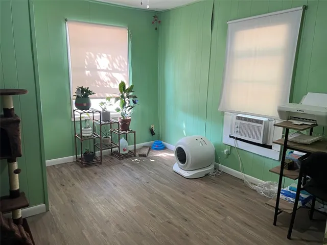 a room with furniture and a window