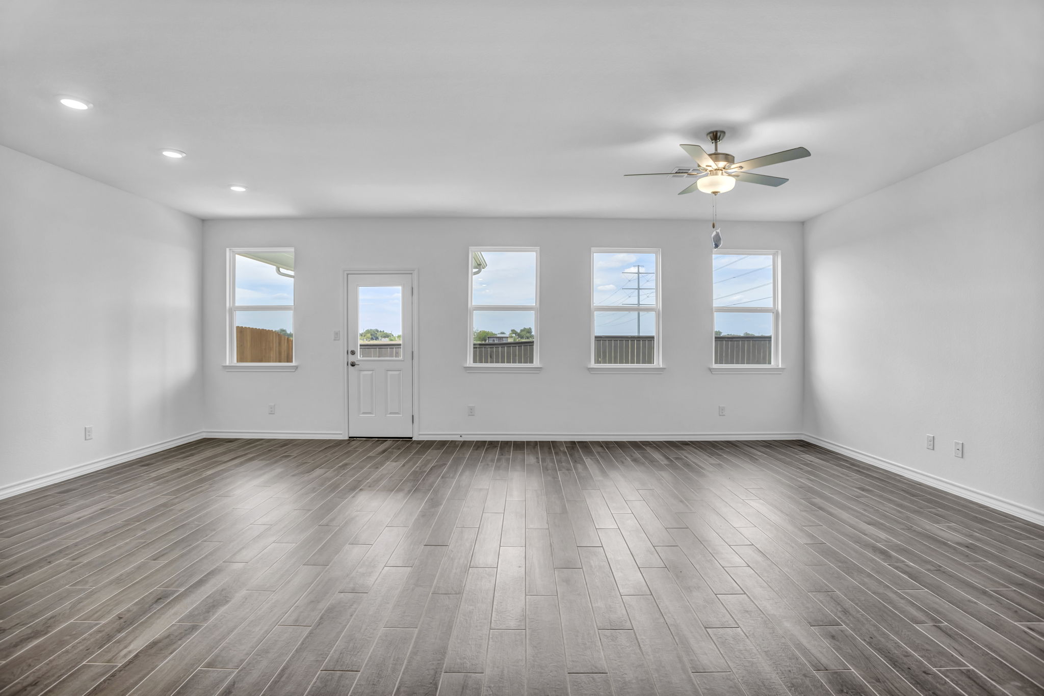 131 Adeline Road Hutto, TX 78634 - Photo 20 of 30 A spacious, naturally illuminated room featuring durable tile flooring and abundant natural light.