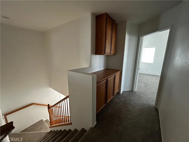 a view of a hallway with entryway