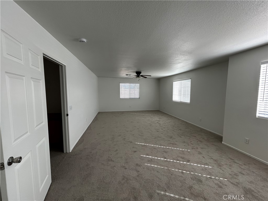 4210 Cloudywing Road Hemet, CA 92545 - Photo 26 of 27 a view of an empty room with a window