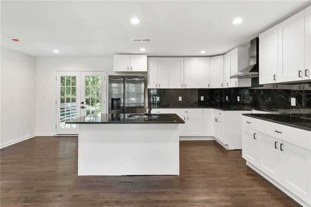 3406 Longleaf Drive Decatur, GA 30032 - Photo 13 of 29 a kitchen with stainless steel appliances granite countertop a sink window and cabinets