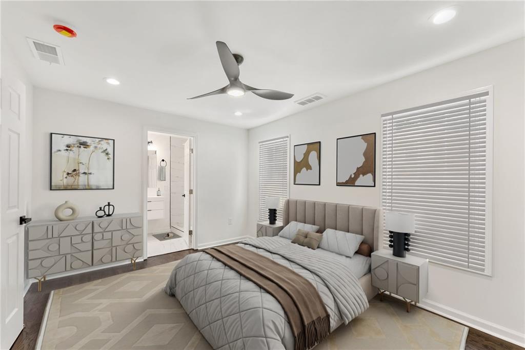 3406 Longleaf Drive Decatur, GA 30032 - Photo 15 of 29 a bedroom with a bed and ceiling fan