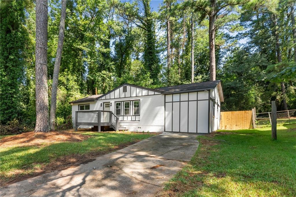 3406 Longleaf Drive Decatur, GA 30032 - Photo 2 of 29 a front view of a house with garden