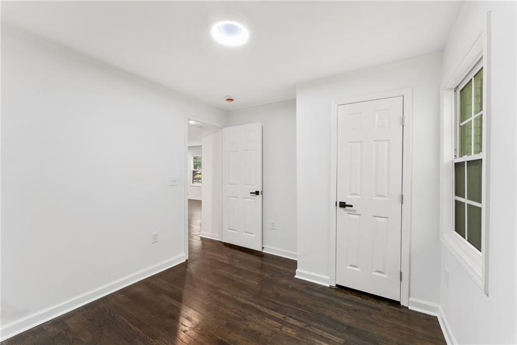 3406 Longleaf Drive Decatur, GA 30032 - Photo 25 of 29 a view of an empty room with wooden floor