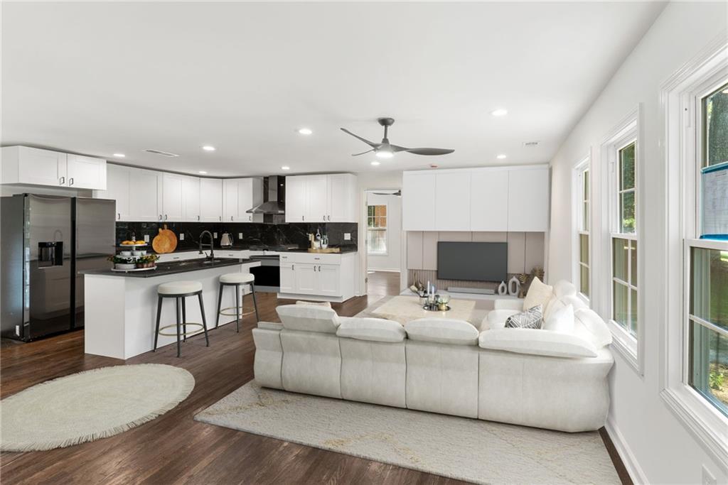 3406 Longleaf Drive Decatur, GA 30032 - Photo 6 of 29 a living room with furniture and a view of kitchen