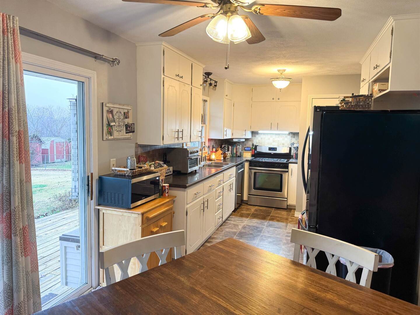 300 Williford Road Jonesboro, IL 62952 - Photo 21 of 34 Kitchen featuring stainless steel appliances, dark