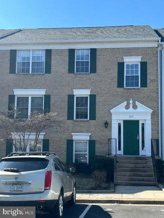 a front view of a house with yard