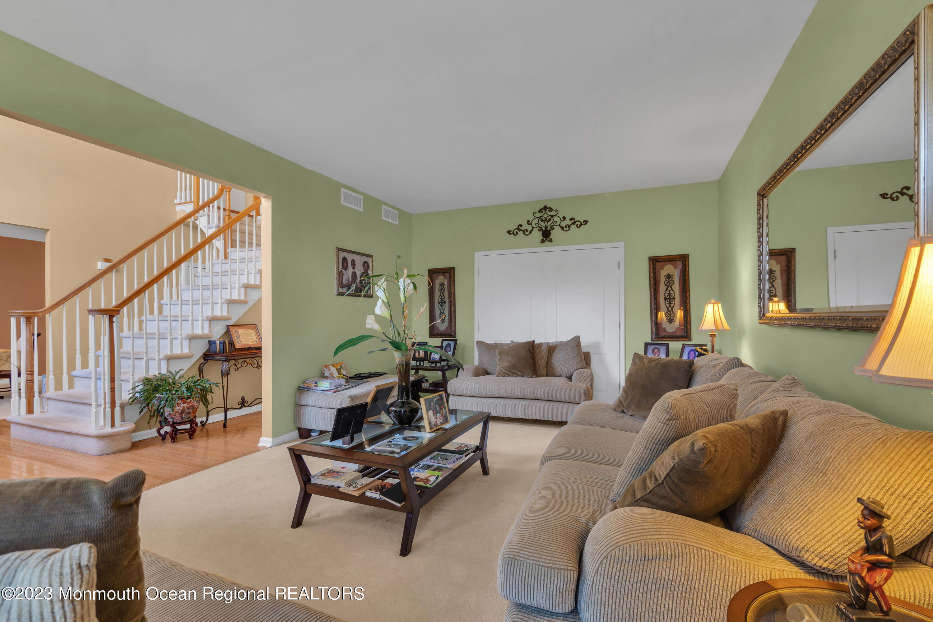 254 Leesville Road Jackson, NJ 08527 - Photo 7 of 37 a living room with furniture and a potted plant