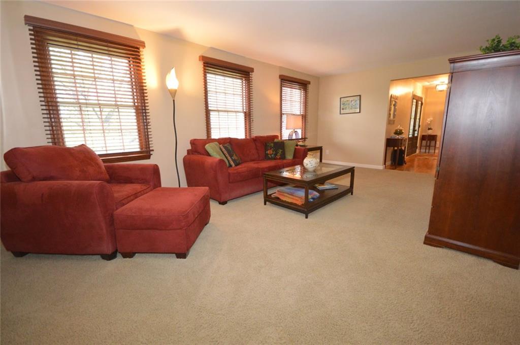 Neutral carpeting and wall color plus lots of natural light!