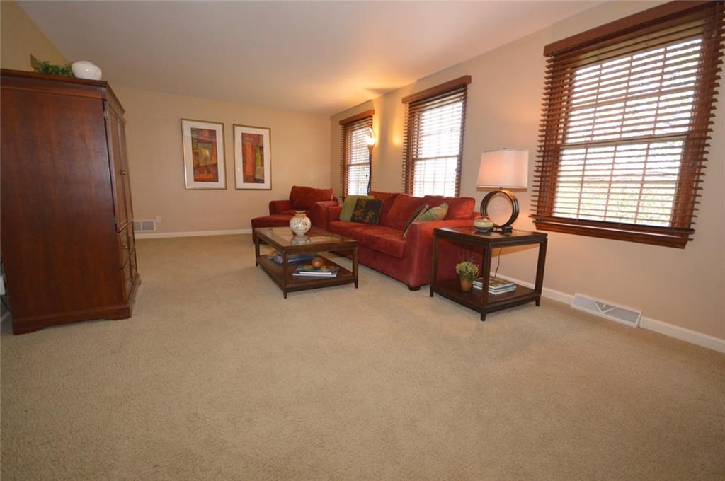 The living room is roomy enough for all of your furniture!