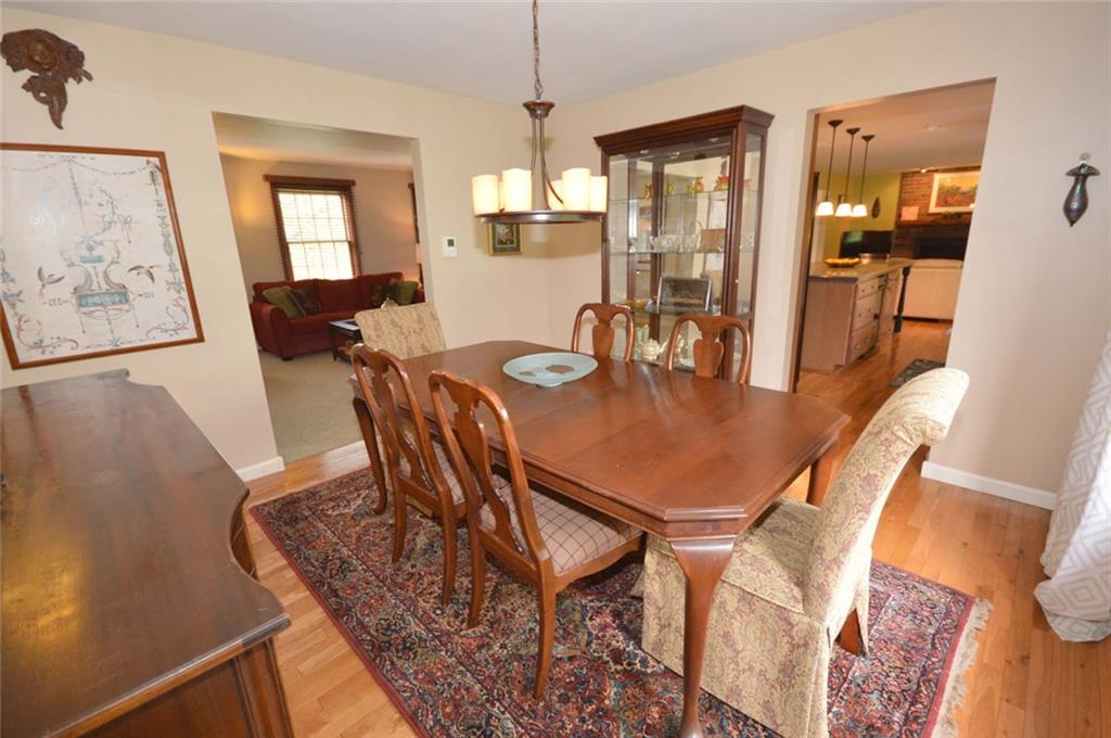 The dining room opens to both the kitchen and living room.