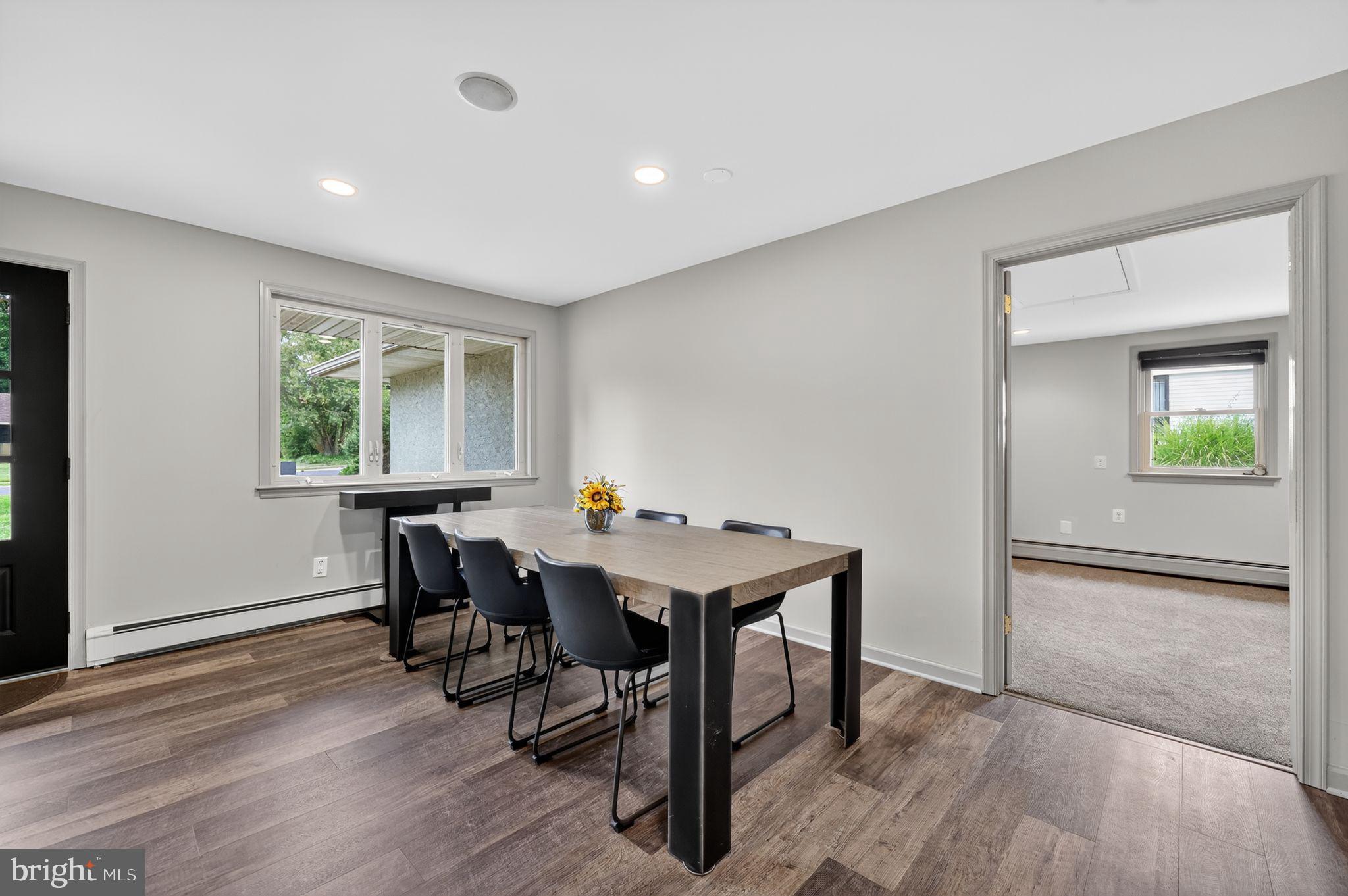 657 Pembroke Road Rydal, PA 19046 - Photo 12 of 36 a view of a dining room with furniture and a window
