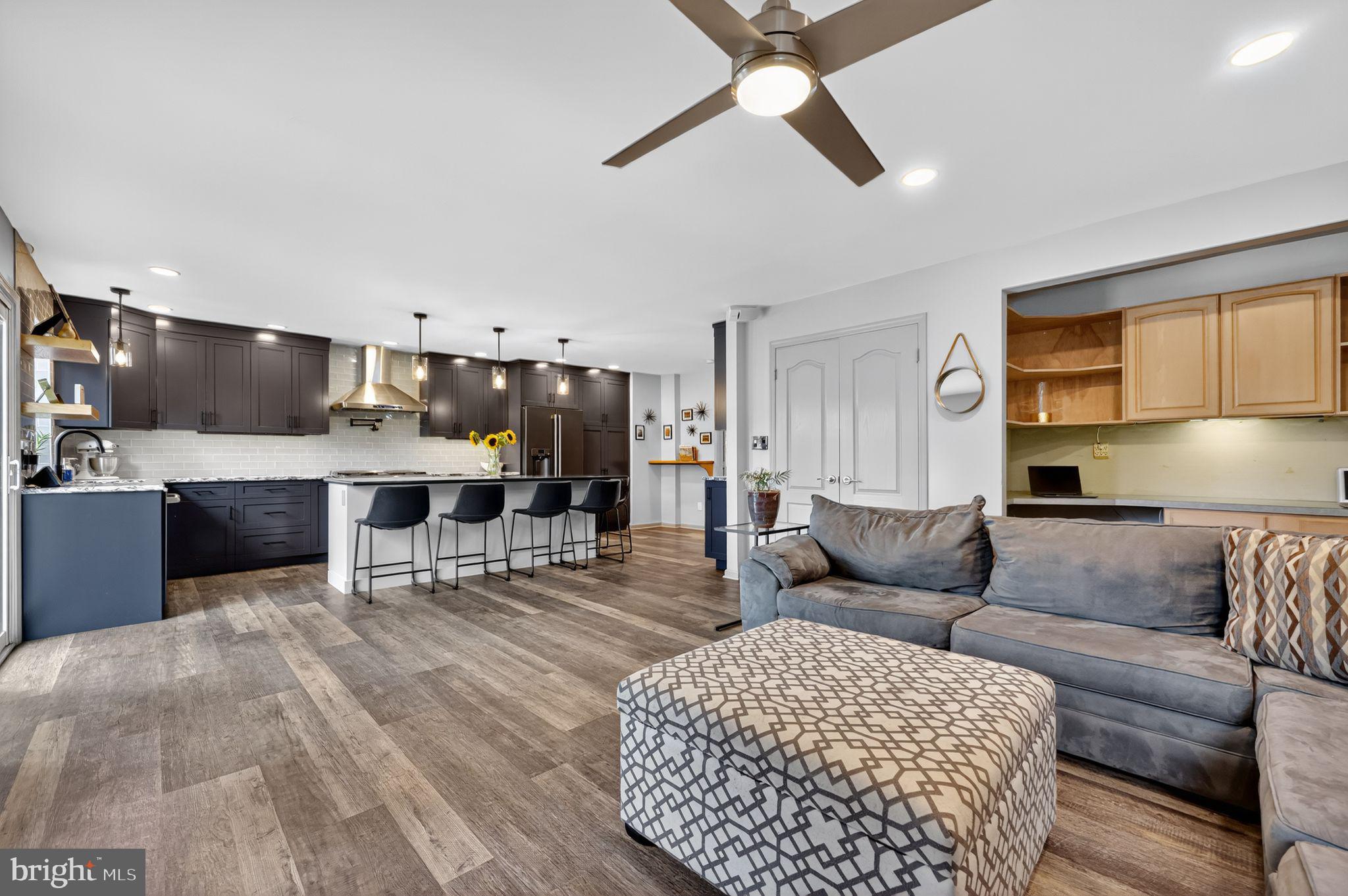 657 Pembroke Road Rydal, PA 19046 - Photo 17 of 36 a living room with furniture and a flat screen tv