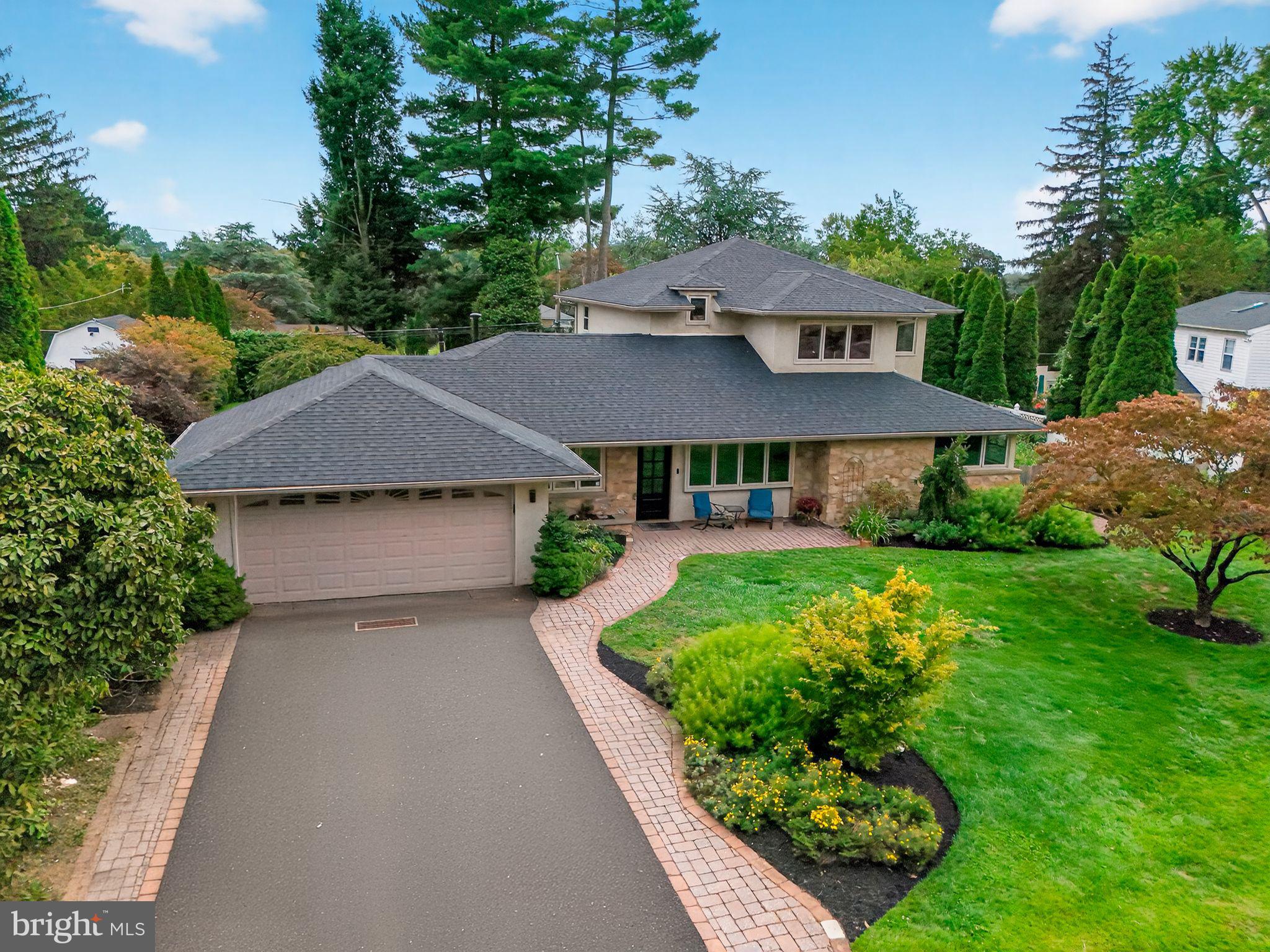 657 Pembroke Road Rydal, PA 19046 - Photo 2 of 36 front view of a house with a yard