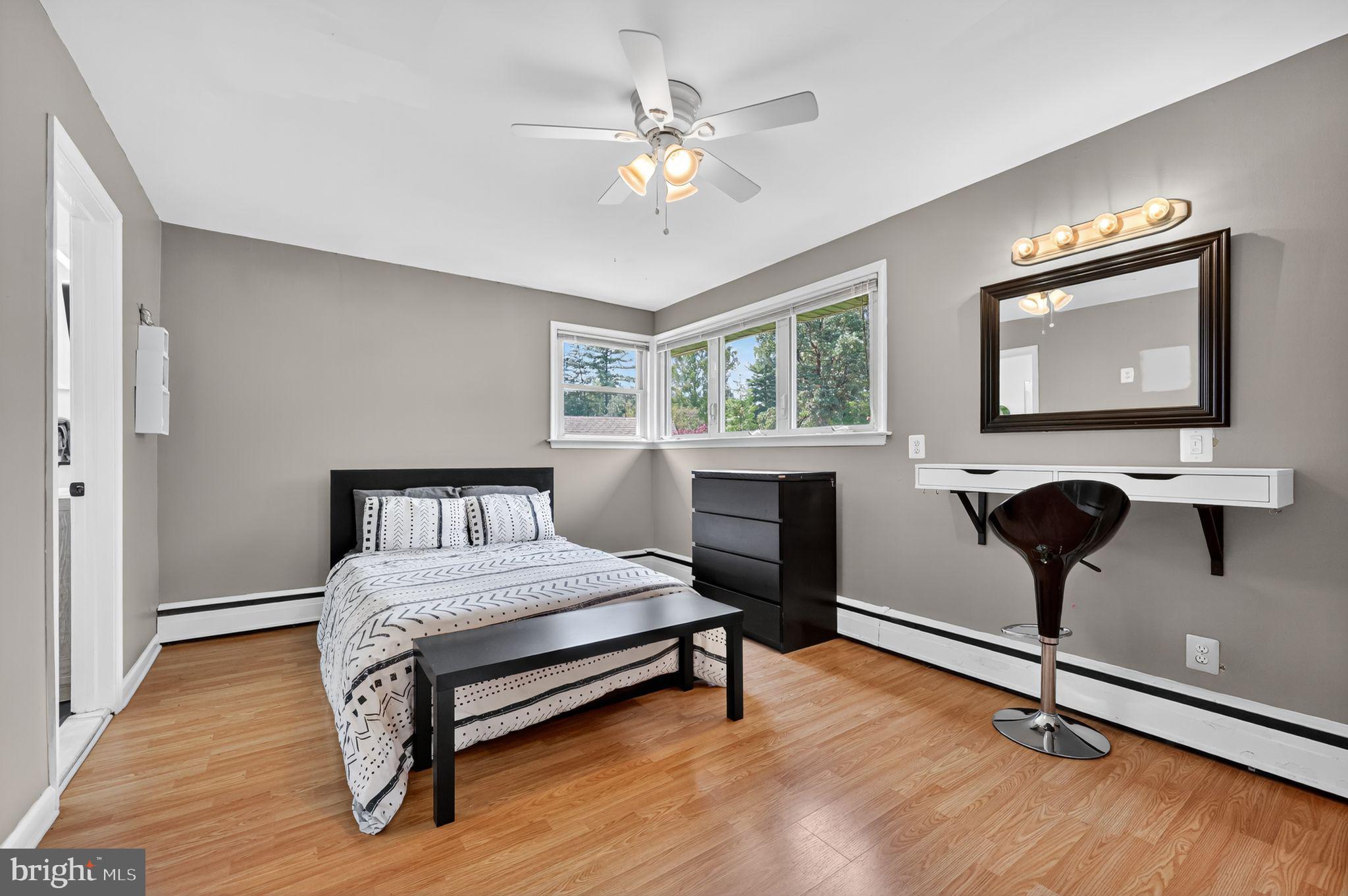 657 Pembroke Road Rydal, PA 19046 - Photo 22 of 36 a bedroom with furniture and a window