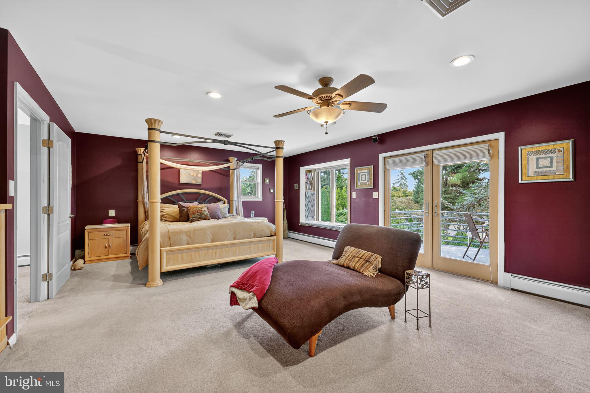 657 Pembroke Road Rydal, PA 19046 - Photo 28 of 36 a bedroom with a bed and a couch