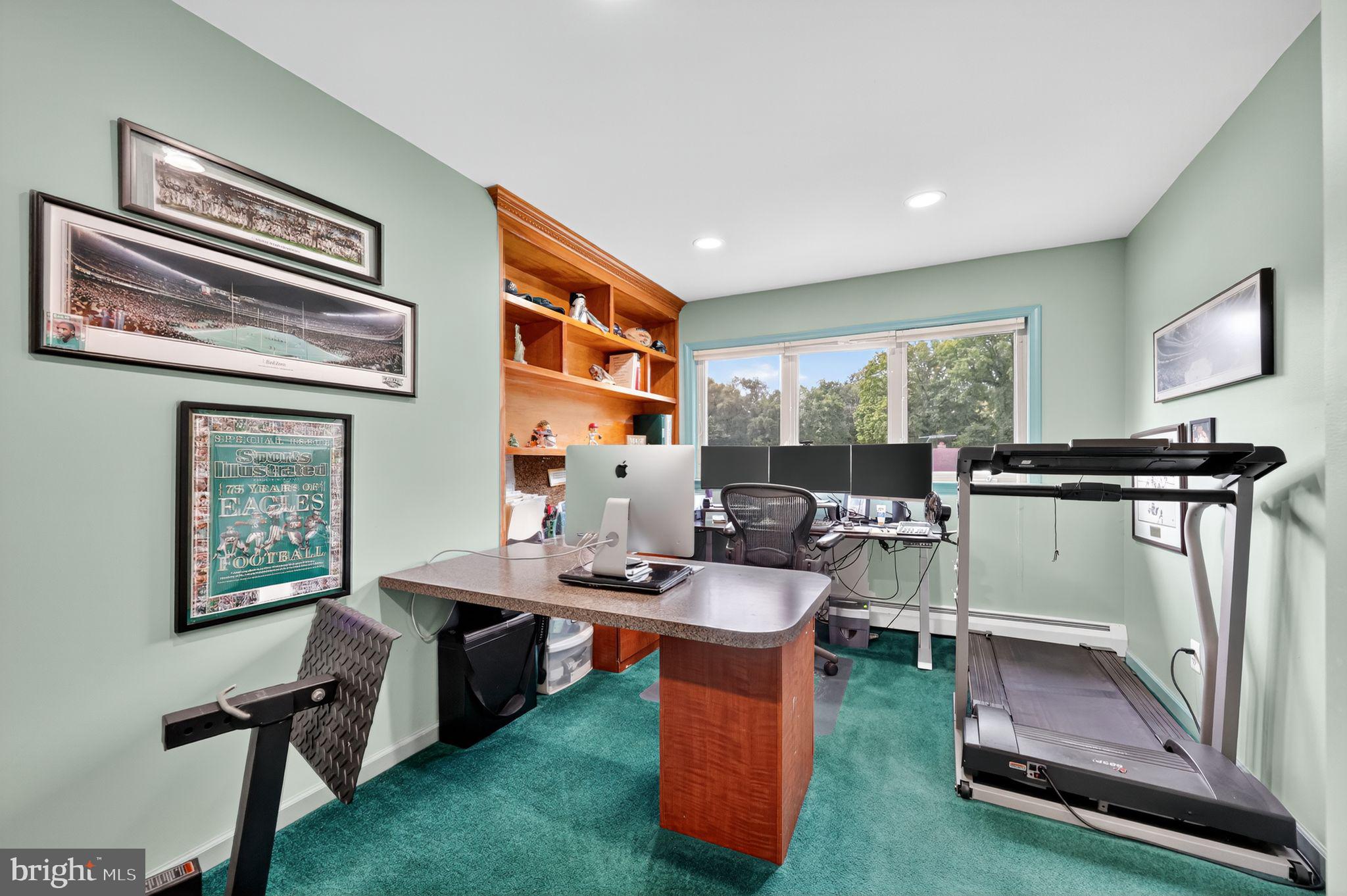 657 Pembroke Road Rydal, PA 19046 - Photo 31 of 36 a living room with furniture a window and a flat screen tv