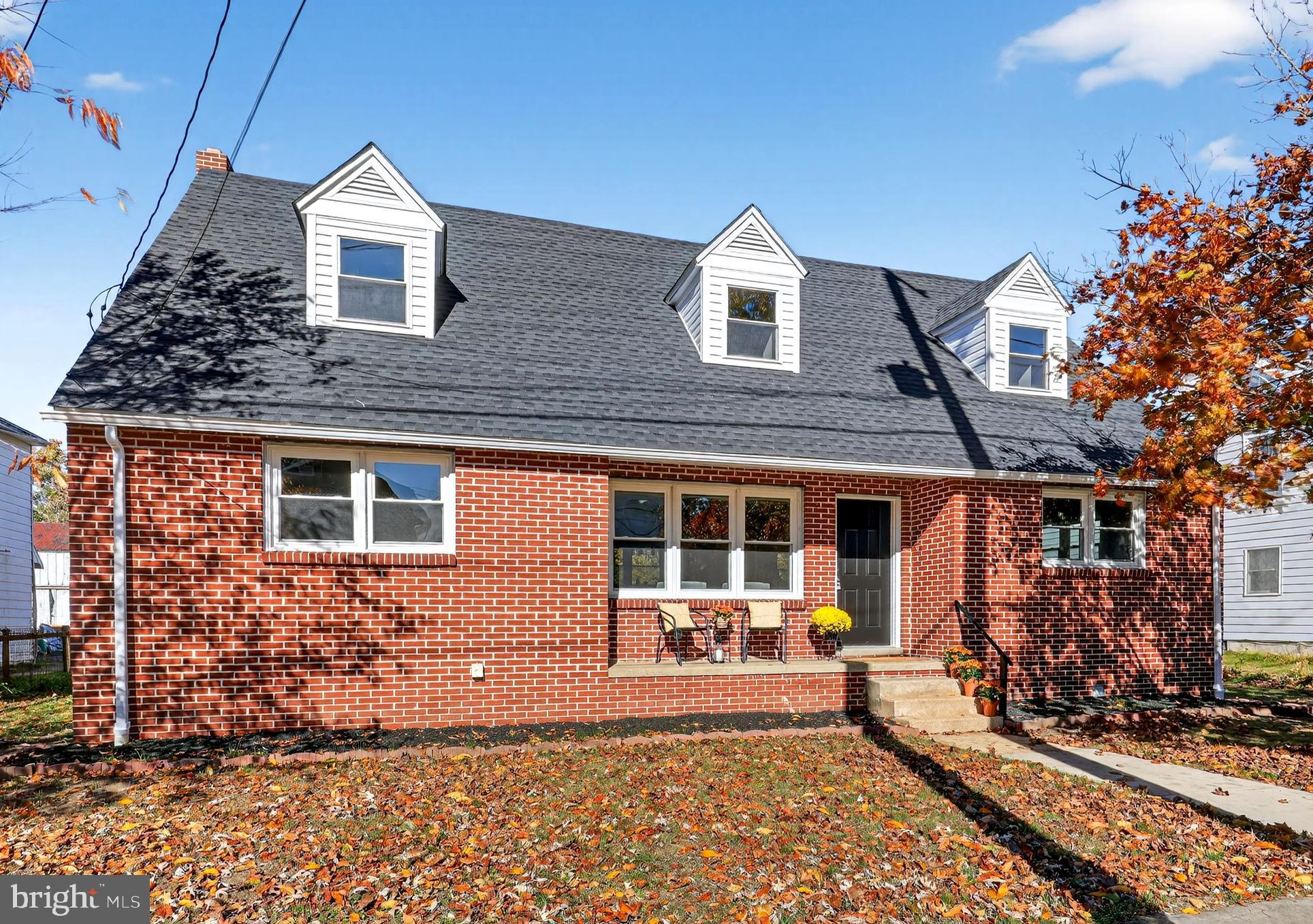 261 West Main Street Elkton, MD 21921 - Photo 1 of 31 a front view of a house with a yard