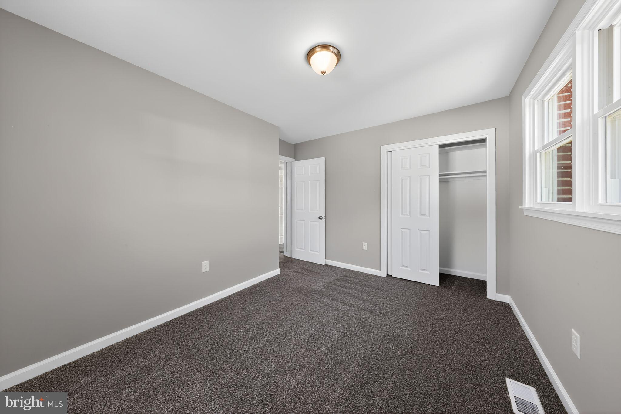 261 West Main Street Elkton, MD 21921 - Photo 19 of 31 a view of an empty room with a window