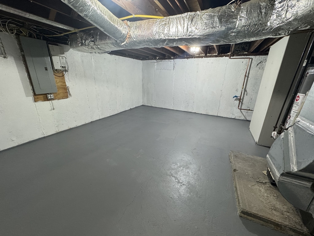 39 Neillian Street, Unit 39 Bedford, MA 01730 - Photo 26 of 29 a view of a garage