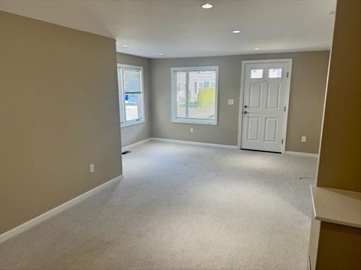 39 Neillian Street, Unit 39 Bedford, MA 01730 - Photo 10 of 29 an empty room with windows and closet