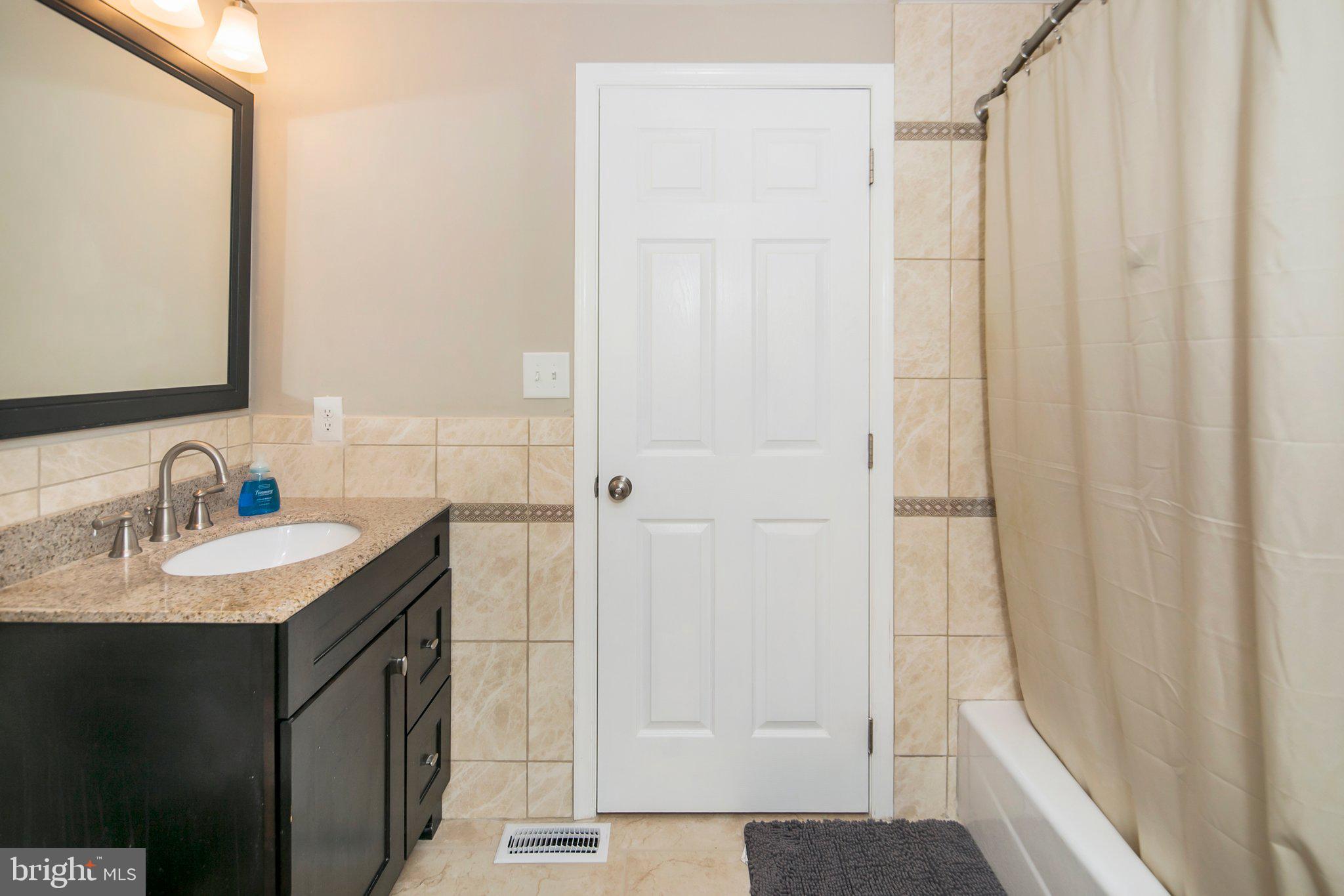 176 Chelsea Road Pasadena, MD 21122 - Photo 13 of 25 Primary Bedroom Ensuite Bathroom