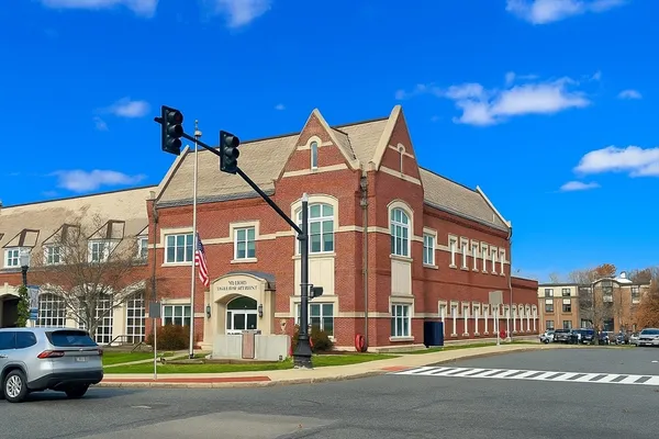 a view of a building with a street view