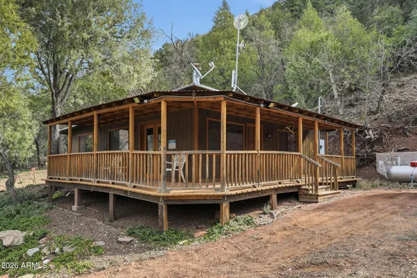 a view of a town with mountains in the background