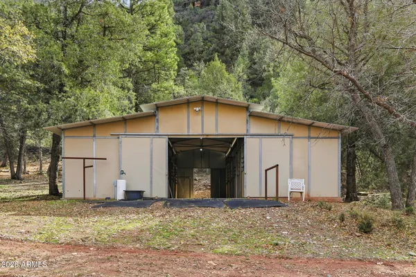 a room with furniture and a chandelier
